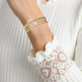 Women's 4-Piece Gold Beaded Stackable Bracelet Set, Fading-Resistant Gold Beaded Elastic Cross Pearl Bracelet